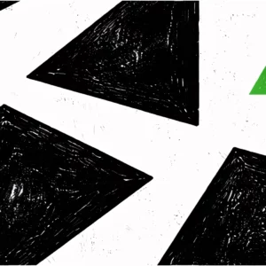 Gros plan sur une linogravure abstraite en noir et blanc, mettant en valeur un triangle vert utilisé comme accent graphique